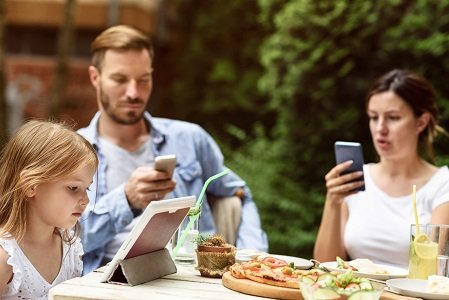 Parents as Guilty as Kids on Too Much Screen Time